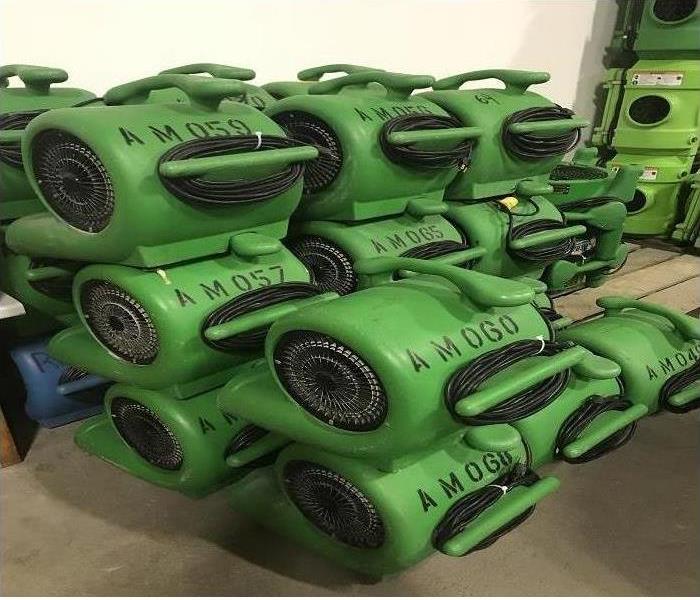 Stacked SERVPRO green air movers
